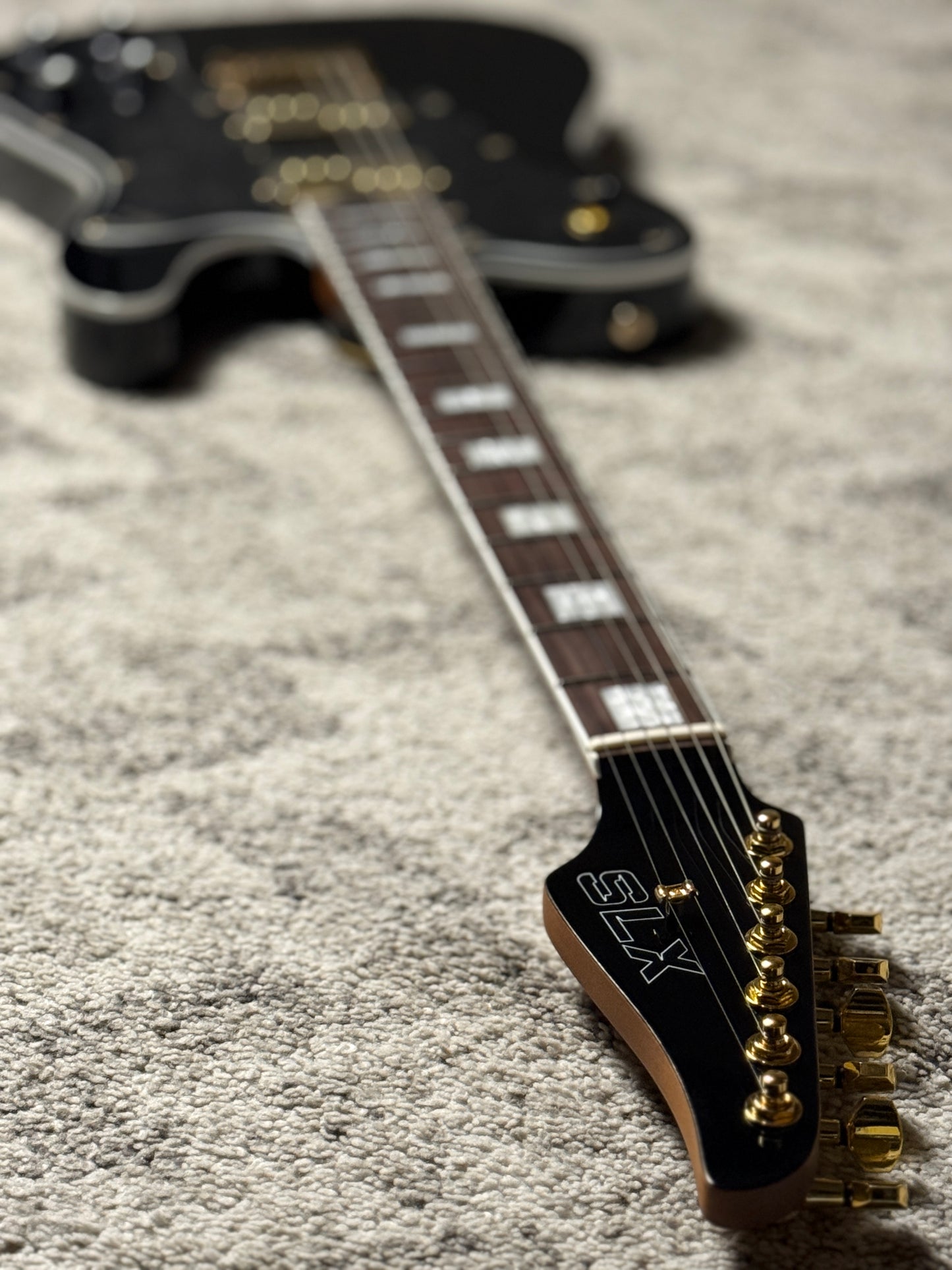 SLX Raven Deluxe HH in Black Beauty with Rosewood FB