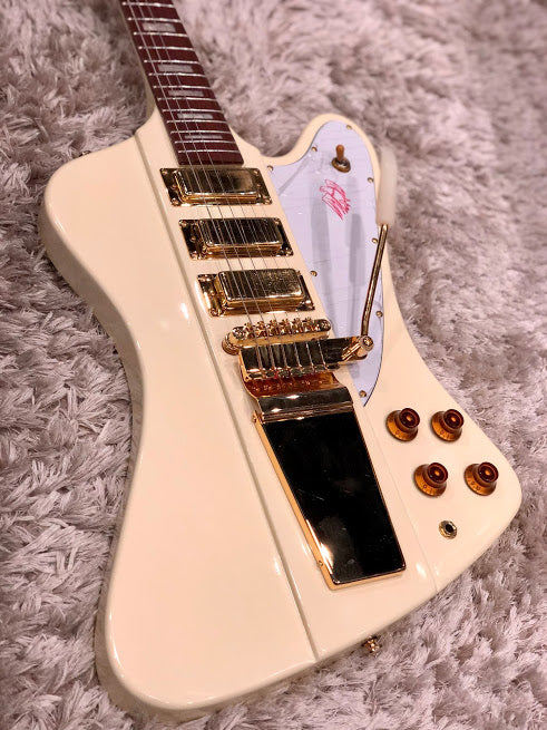 Tokai FB90 AI in Antique Ivory Firebird with Vibrola