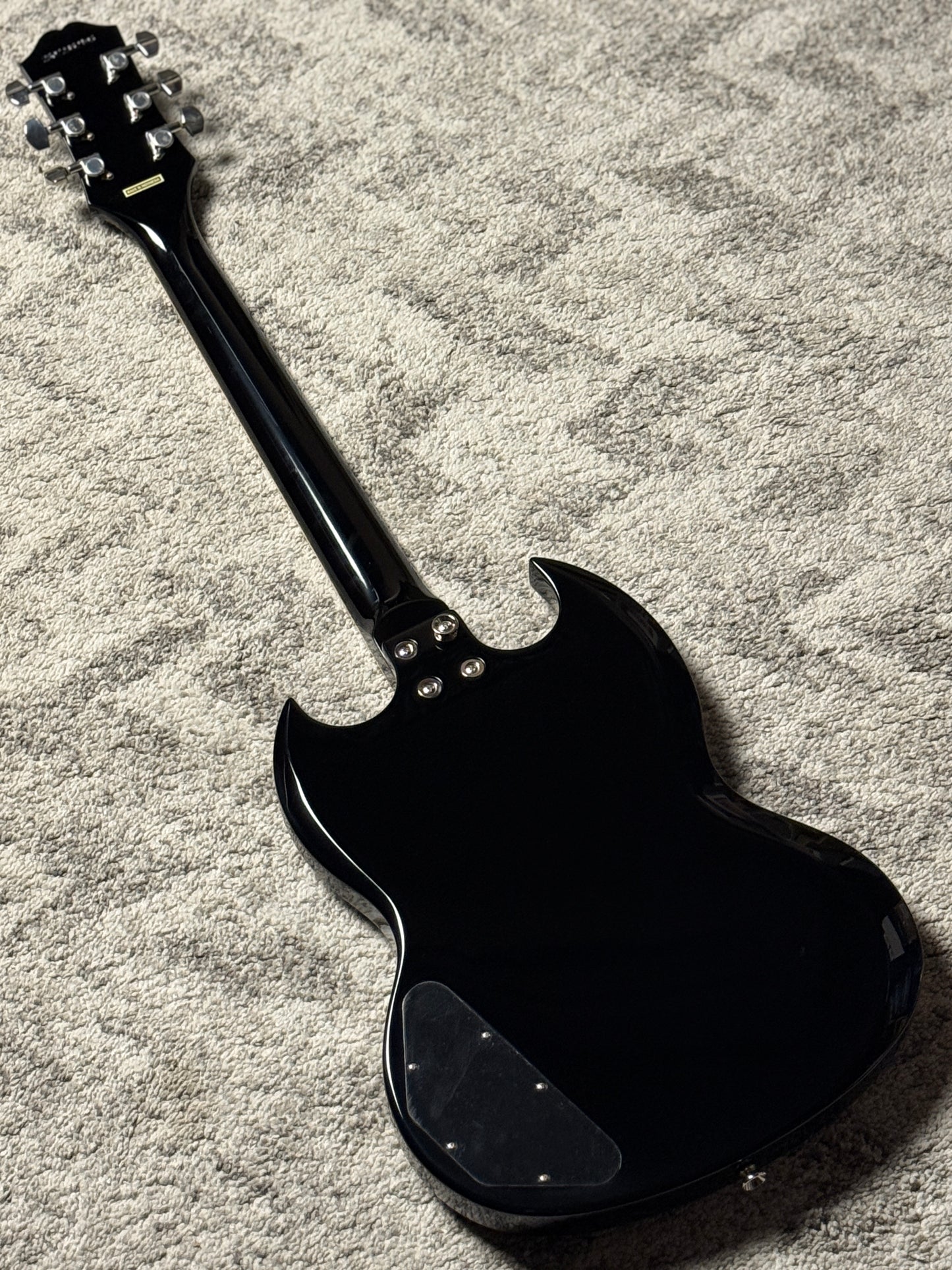 Epiphone SG Tribute Plus in Transparent Ebony
