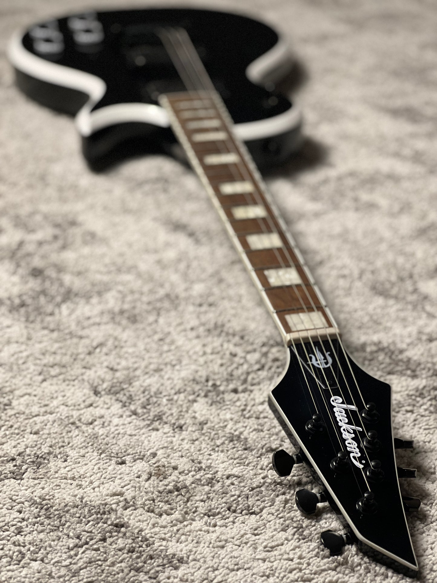Jackson X Series Signature Marty Friedman MF-1 with Laurel FB in Gloss Black with White Bevels