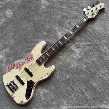 Dhatarattha Custom DEB 4 String Bass in Olympic White over Pink Paisley with RW FB with Nitrocellulose Lacquer Relic