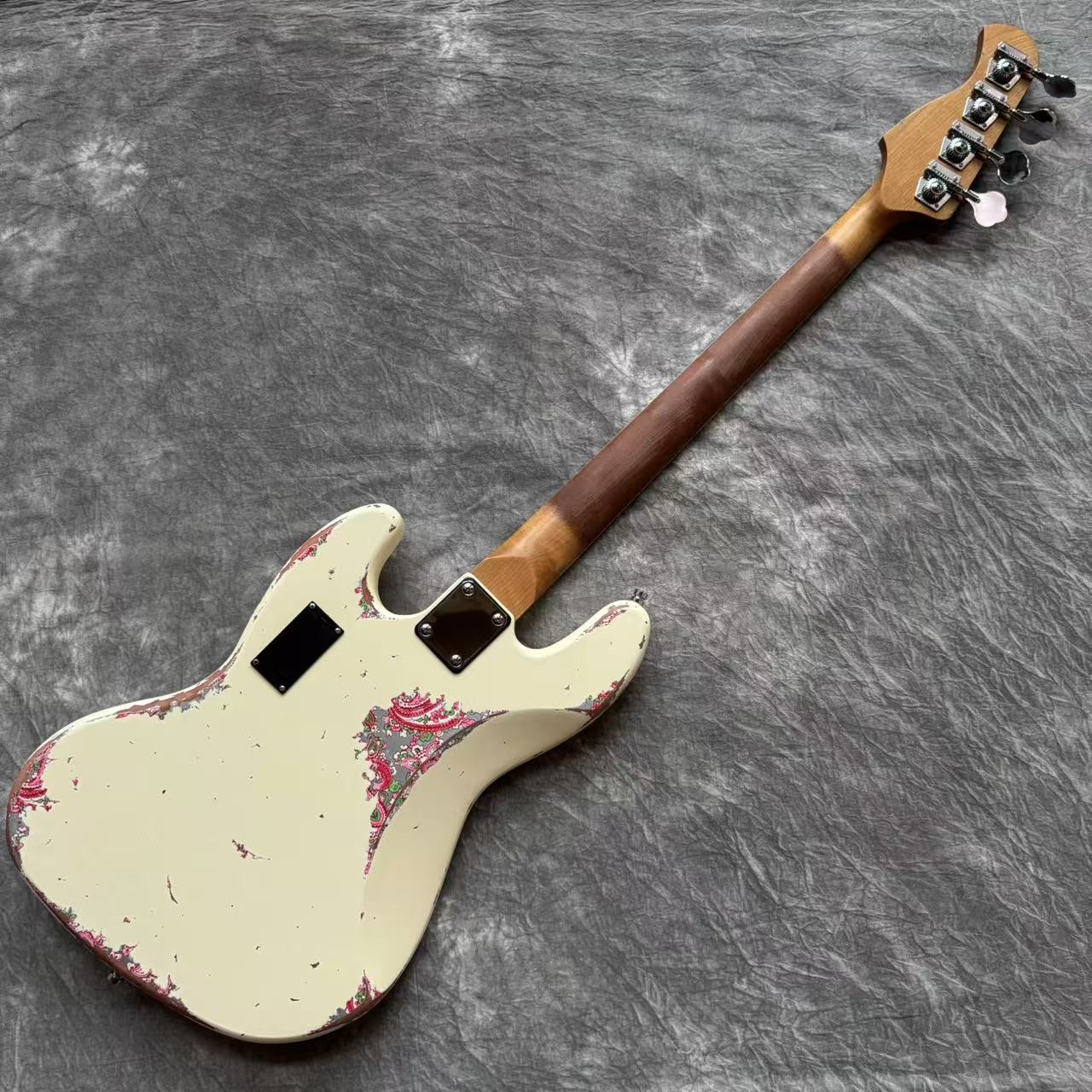 Dhatarattha Custom DEB 4 String Bass in Olympic White over Pink Paisley with RW FB with Nitrocellulose Lacquer Relic