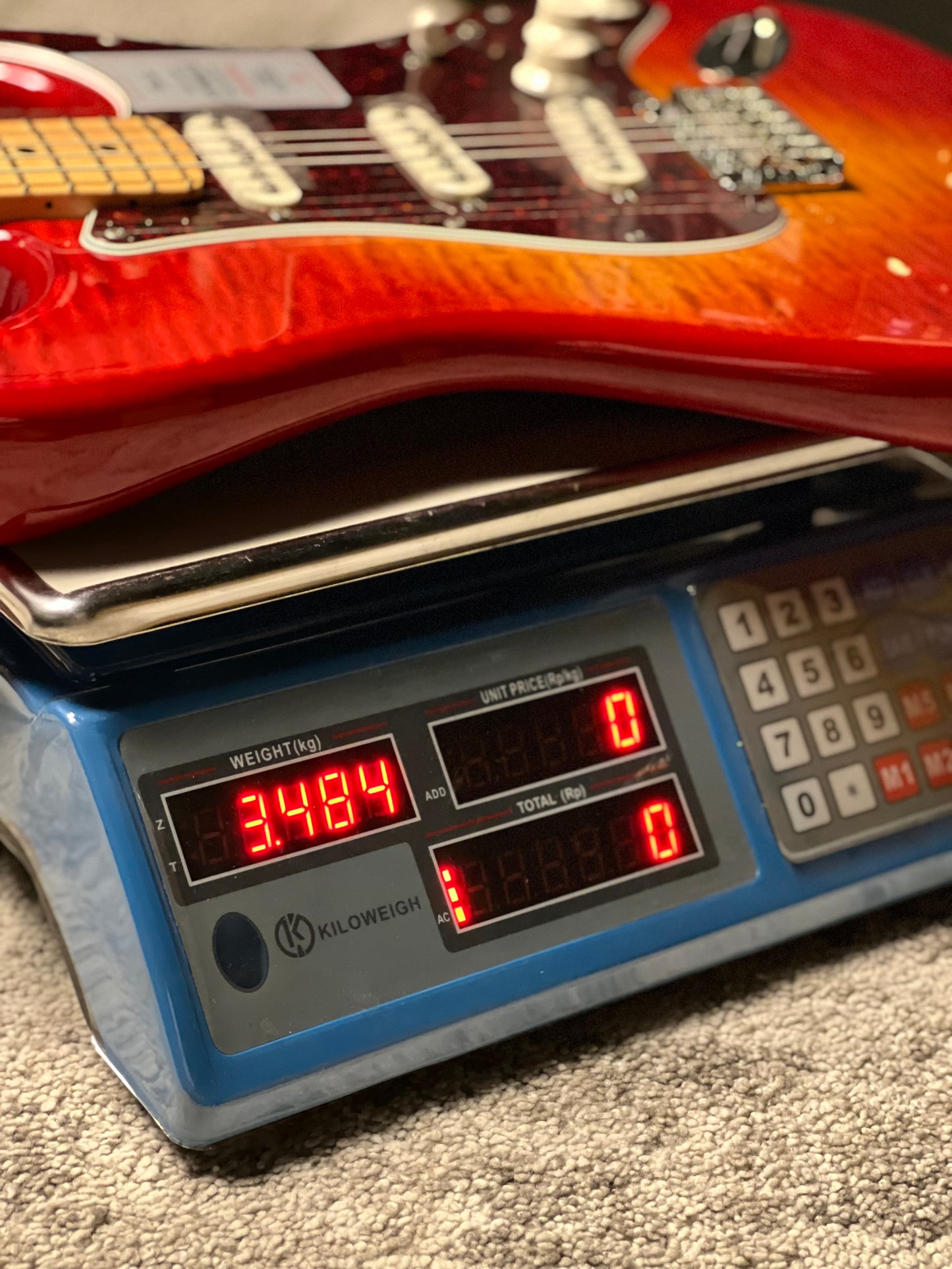 Fender Japan Hybrid II Stratocaster with Maple FB in Flame Sunset Orange Transparent JD24010017