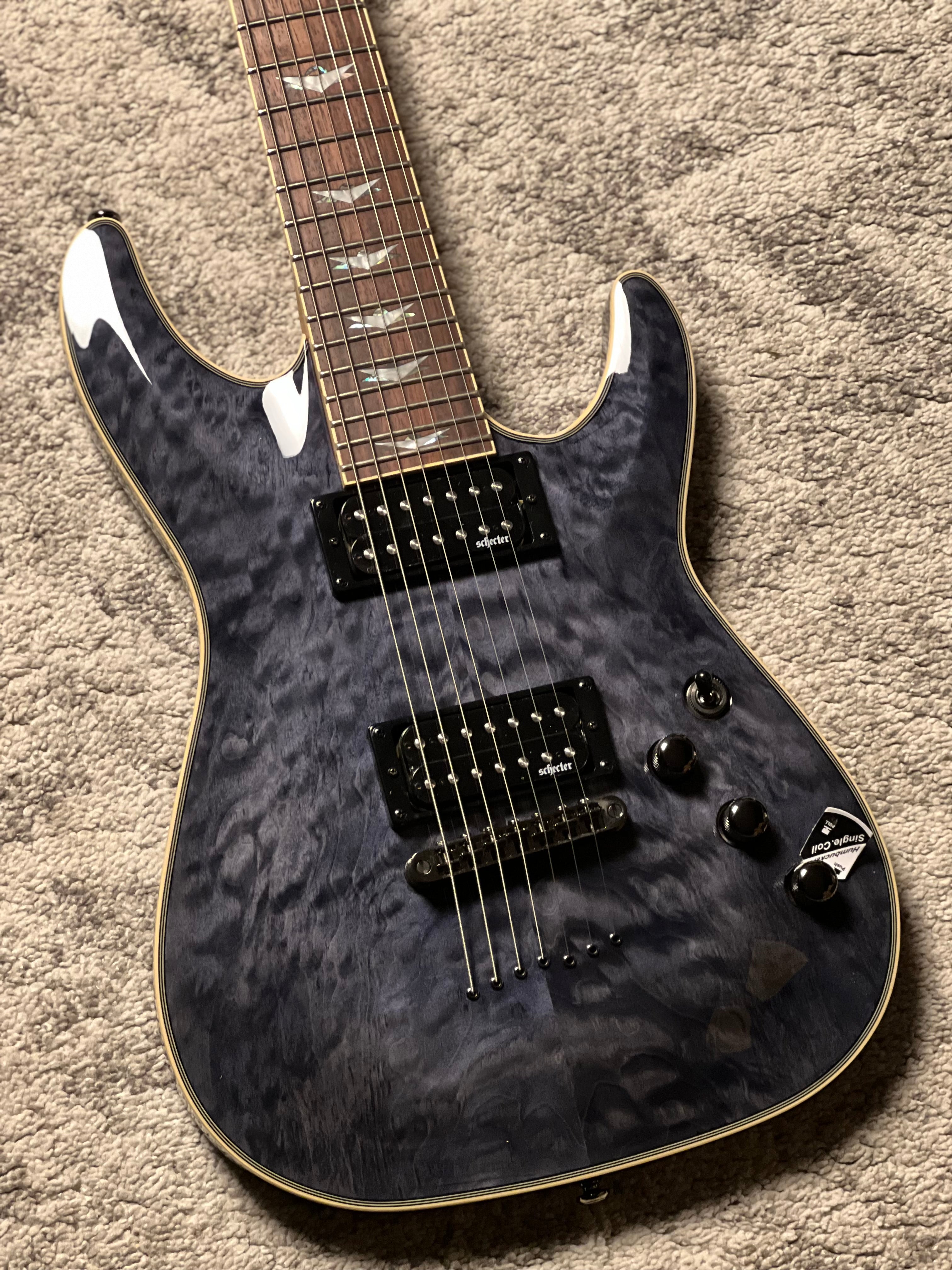 Schecter Omen Extreme-7 in See Thru Black – nafiriguitar.com
