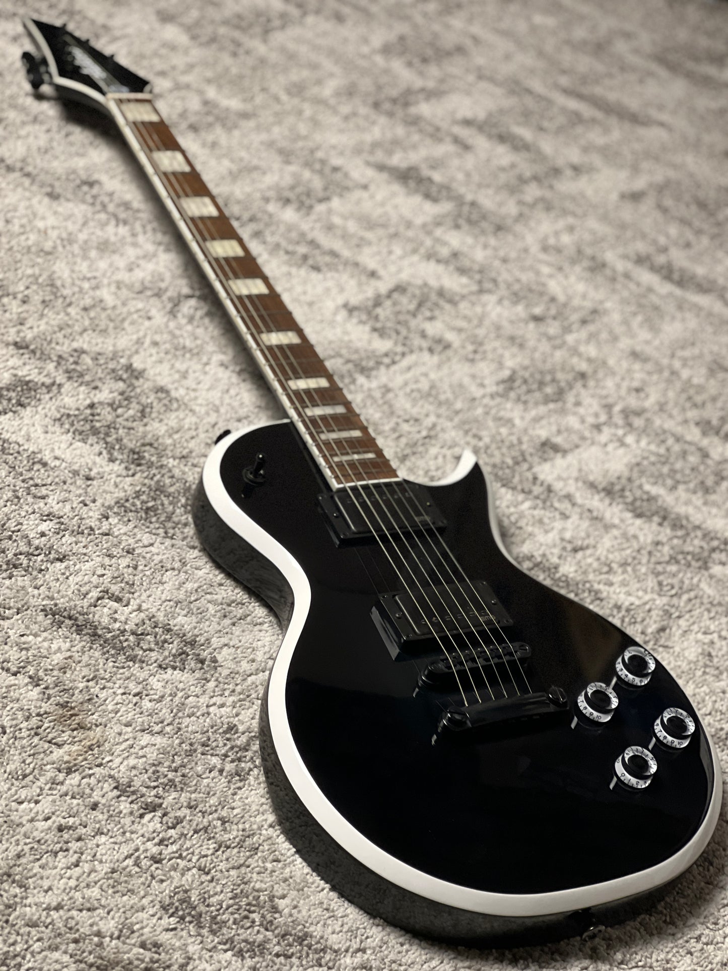 Jackson X Series Signature Marty Friedman MF-1 with Laurel FB in Gloss Black with White Bevels