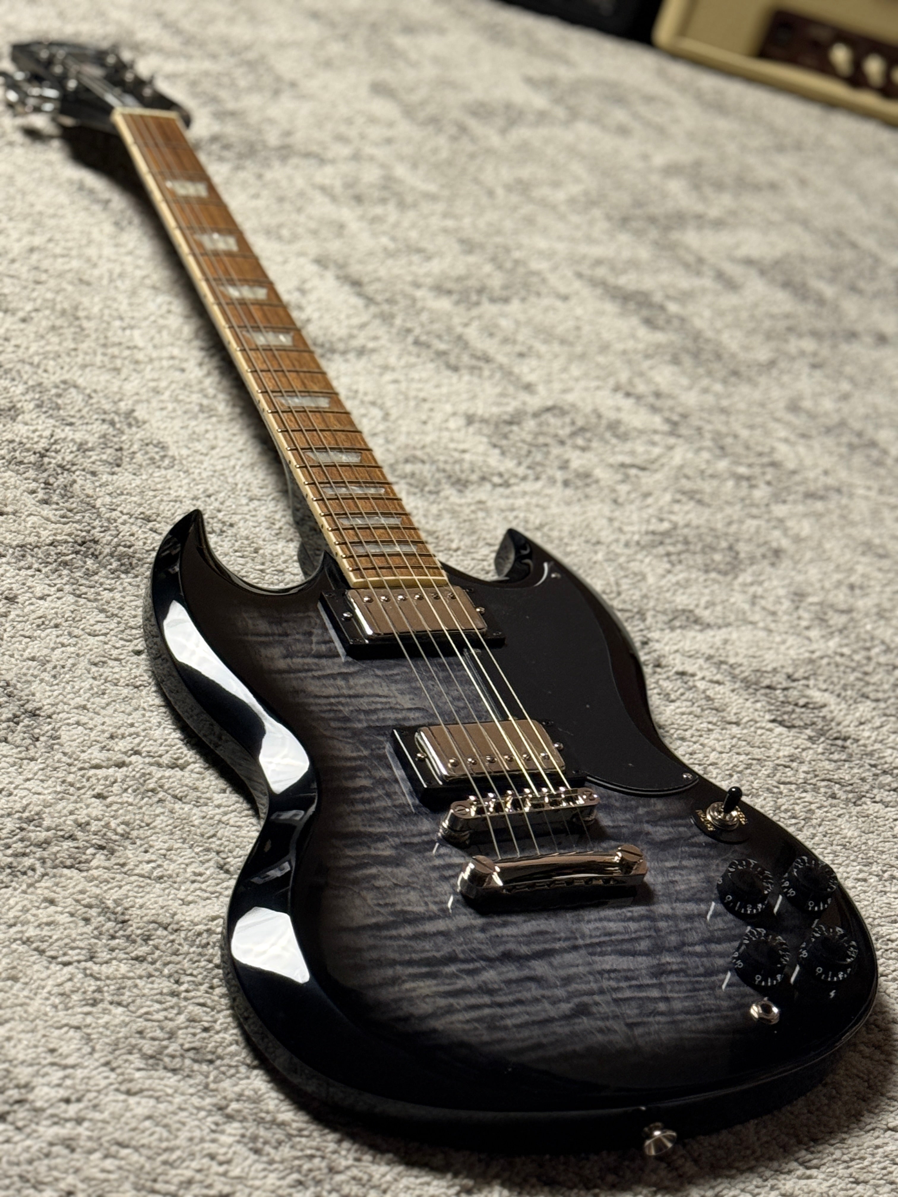 Epiphone SG Tribute Plus in Transparent Ebony – nafiriguitar.com