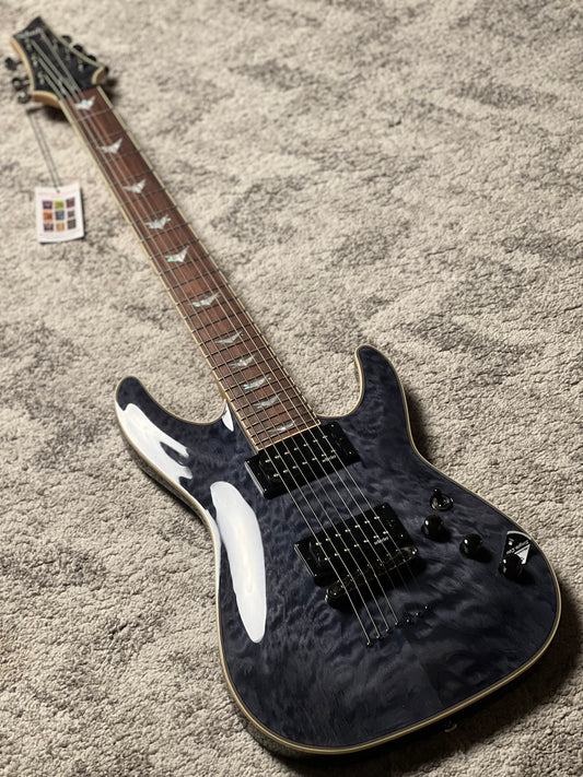 Schecter Omen Extreme-7 in See Thru Black