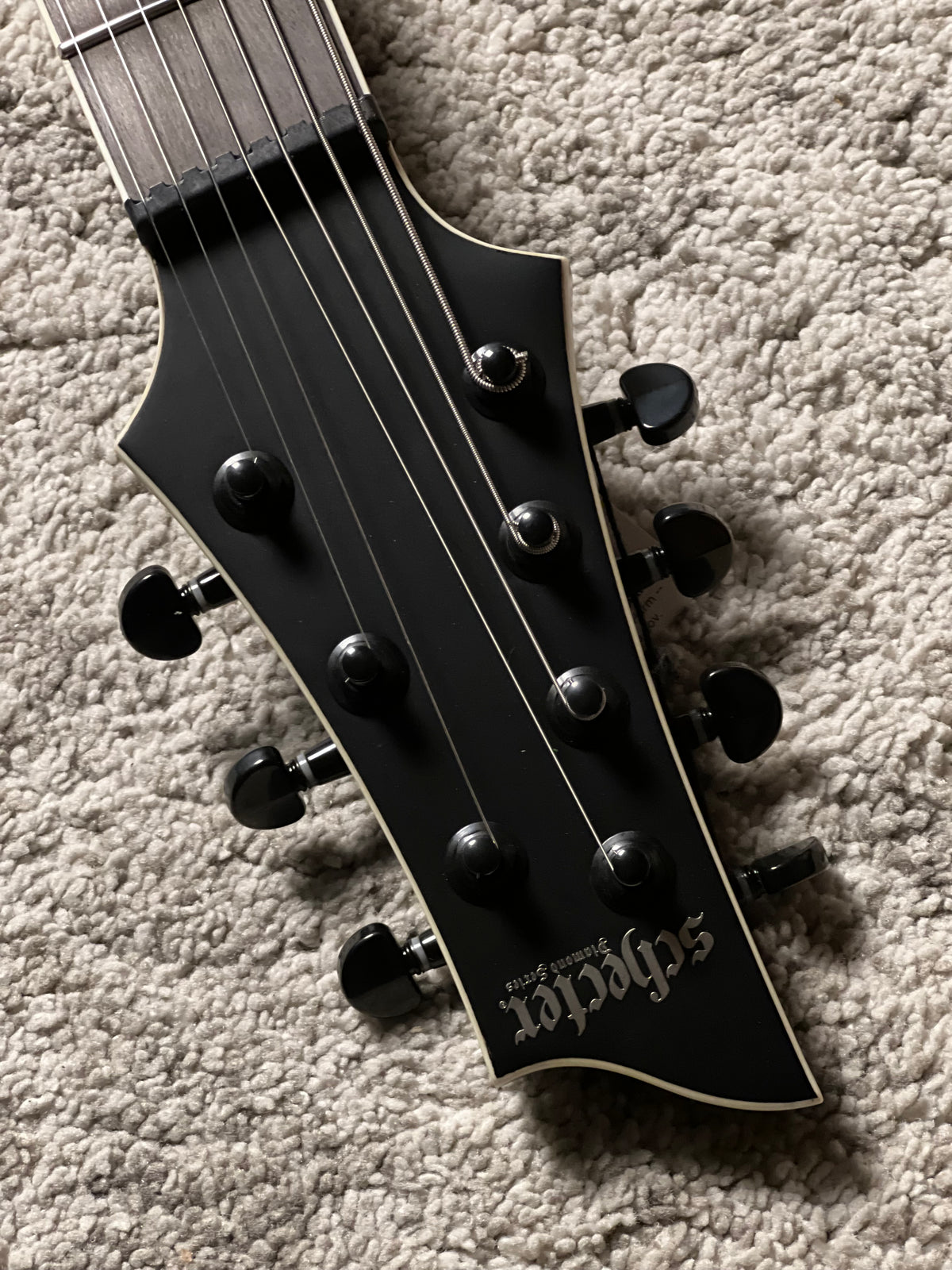 Schecter C-7 SLS Elite Evil Twin in Satin Black