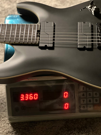 Schecter C-7 SLS Elite Evil Twin in Satin Black