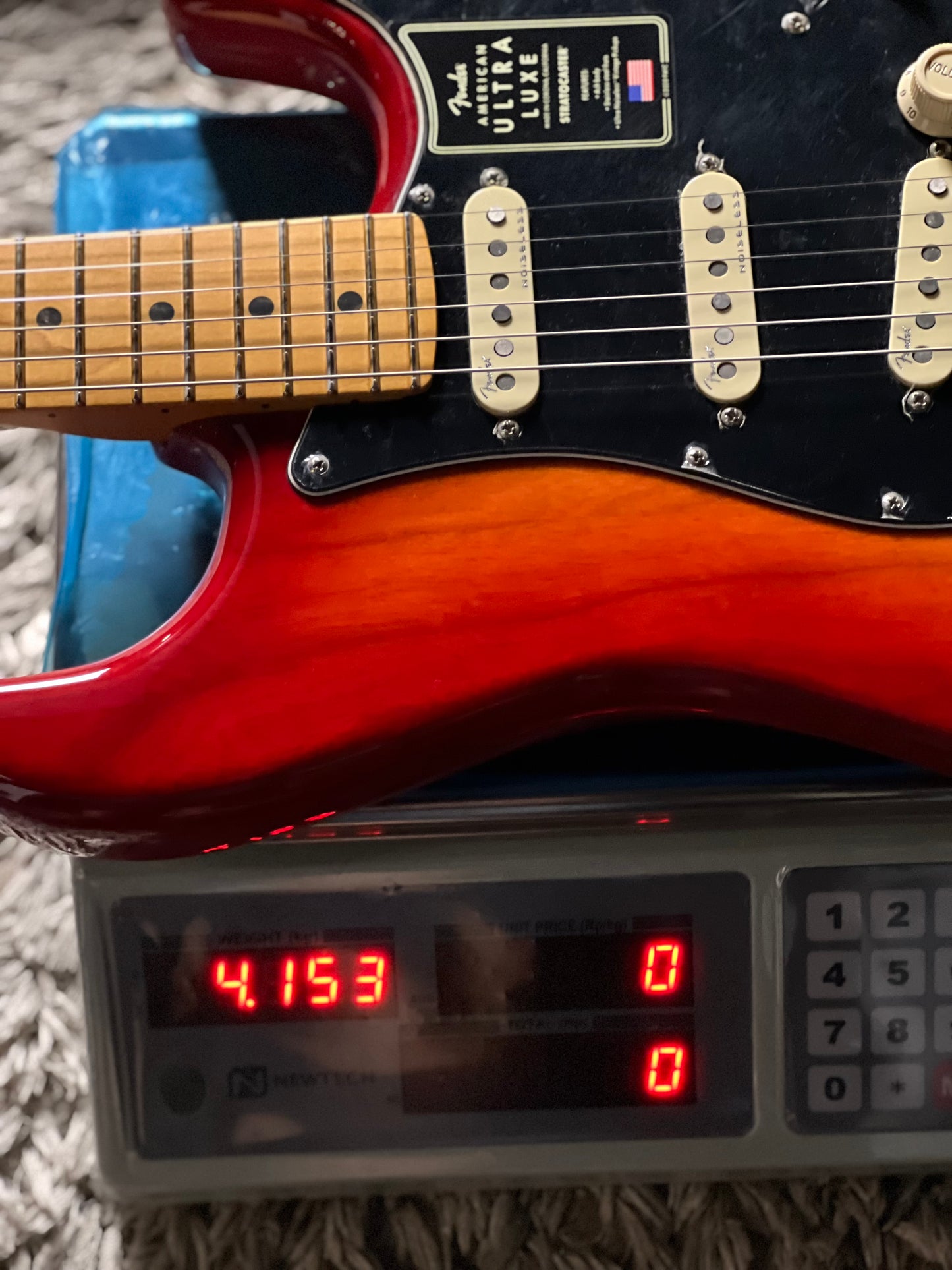 Fender American Ultra Luxe Stratocaster with Maple FB in Plasma Red Burst US210079410