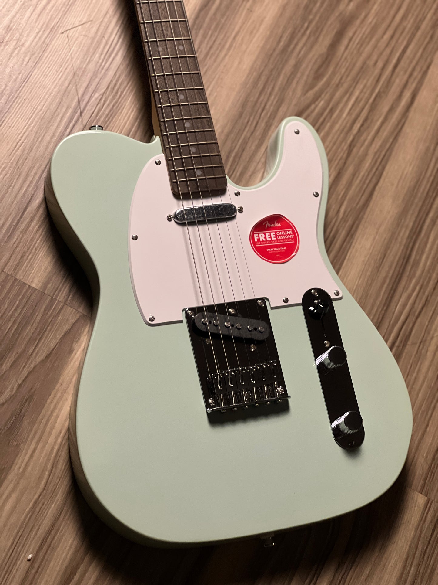 Squier FSR Sonic Telecaster with White Pickguard and Laurel FB in Surf Green