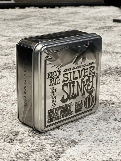 Ernie Ball John Mayer Silver Slinky Nickel Wound Electric Guitar Strings, 10.5-47, 3-Pack Tin