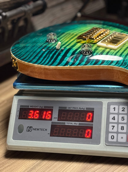 SLX Imperial 24 HH with 5A Solid Flame Top in Laguna Glow with Gold Hardware