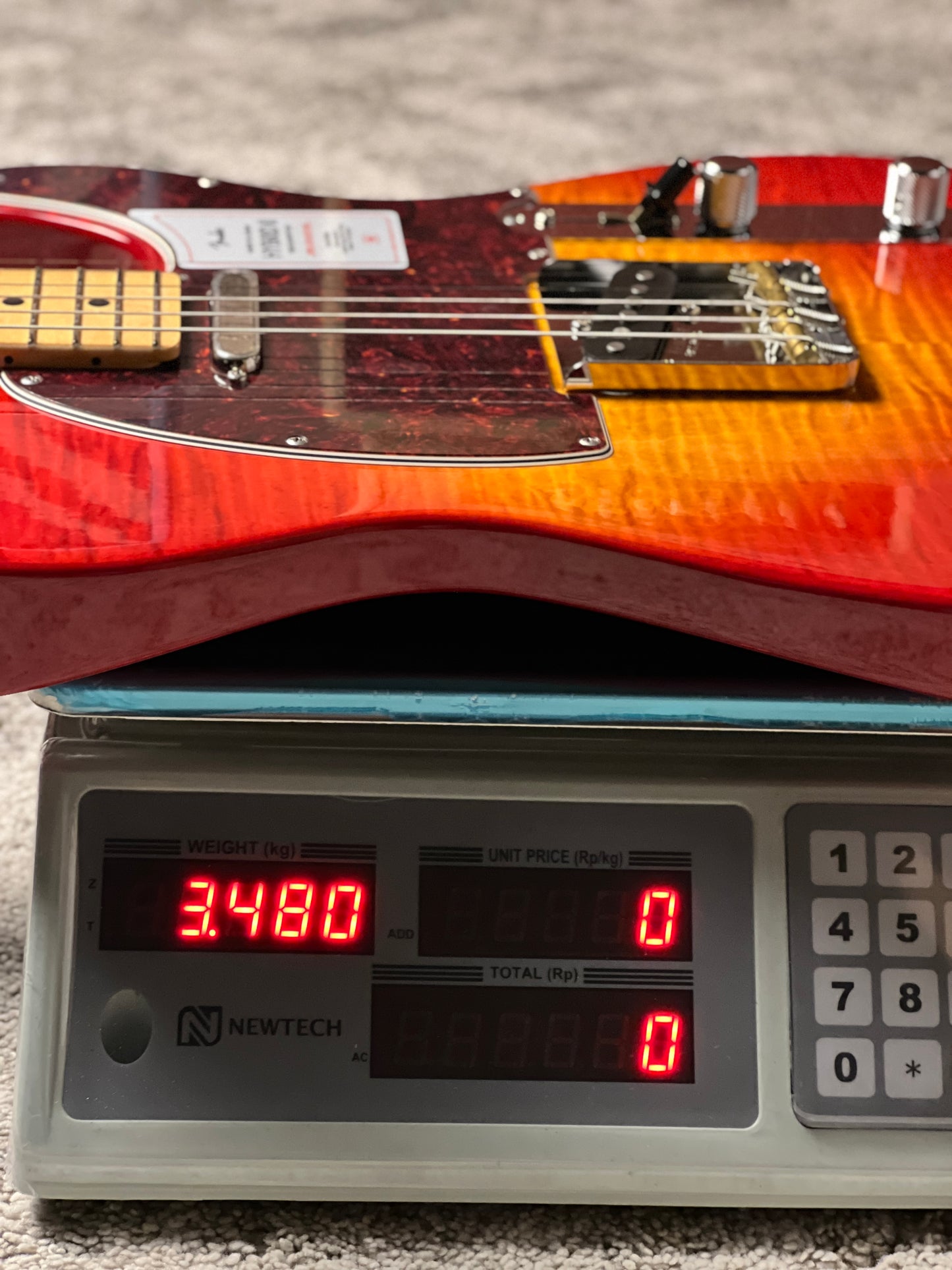 Fender Japan Hybrid II Telecaster with Maple FB in Flame Sunset Orange Transparent JD24010467