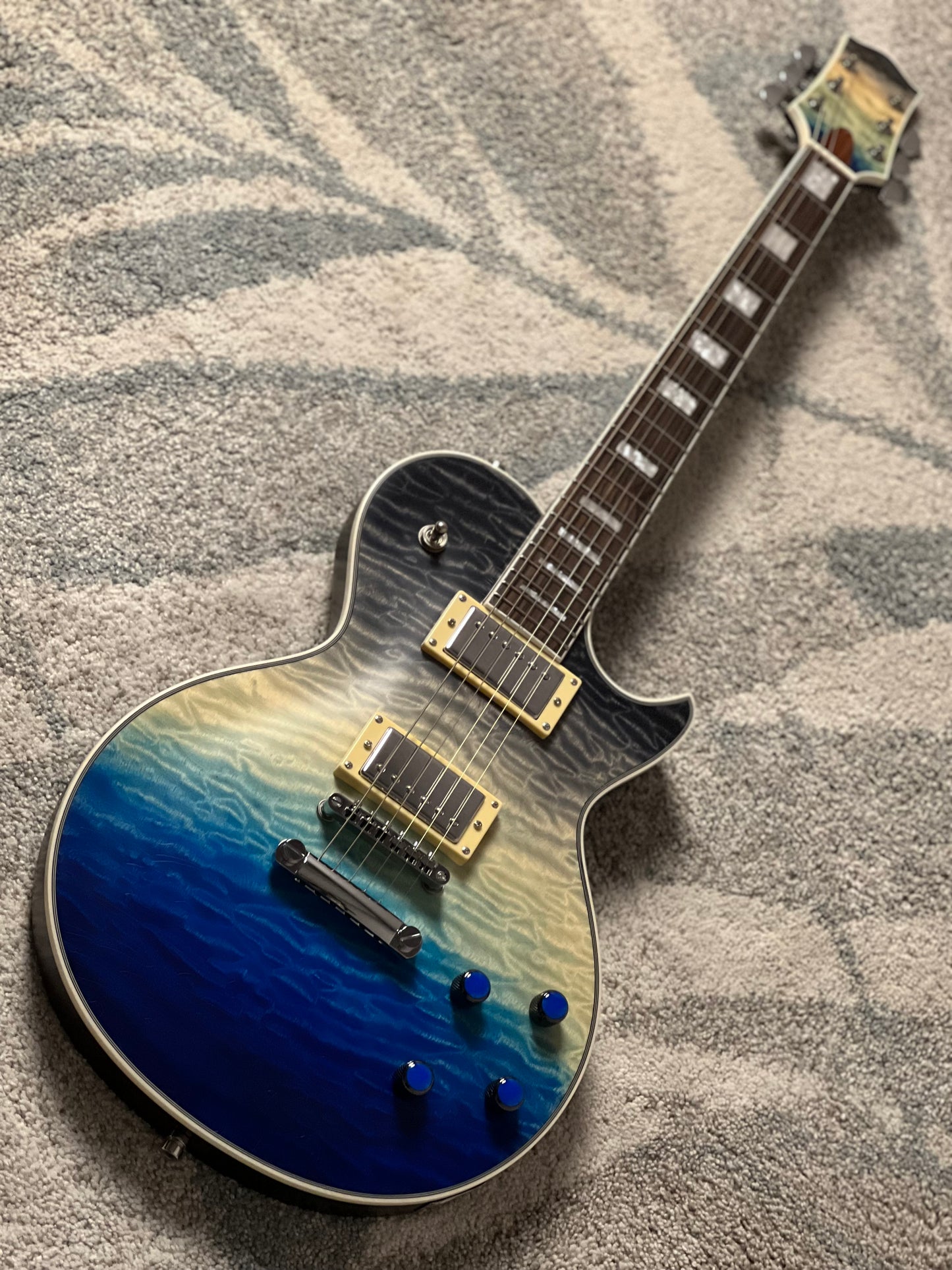 Dhatarattha Custom DLP in Ocean Storm Double Wipeout with 5A Quilt Top