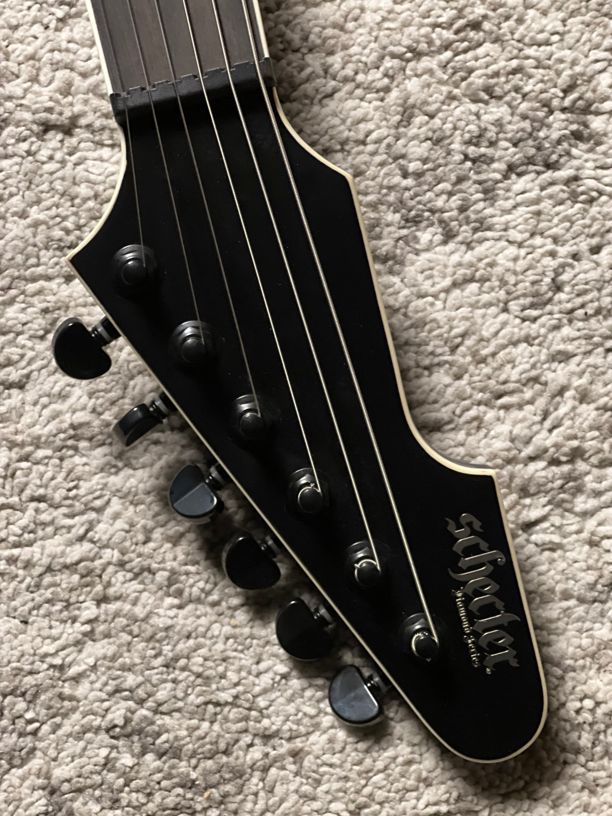Schecter E-1 SLS Evil Twin in Satin Black