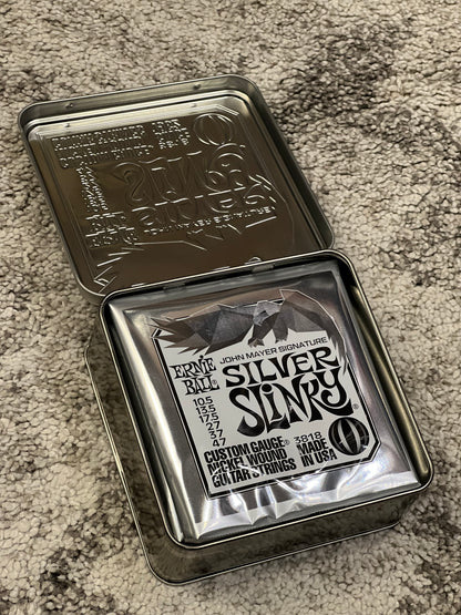 Ernie Ball John Mayer Silver Slinky Nickel Wound Electric Guitar Strings, 10.5-47, 3-Pack Tin