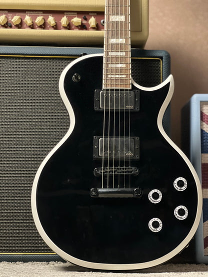 Jackson X Series Signature Marty Friedman MF-1 with Laurel FB in Gloss Black with White Bevels