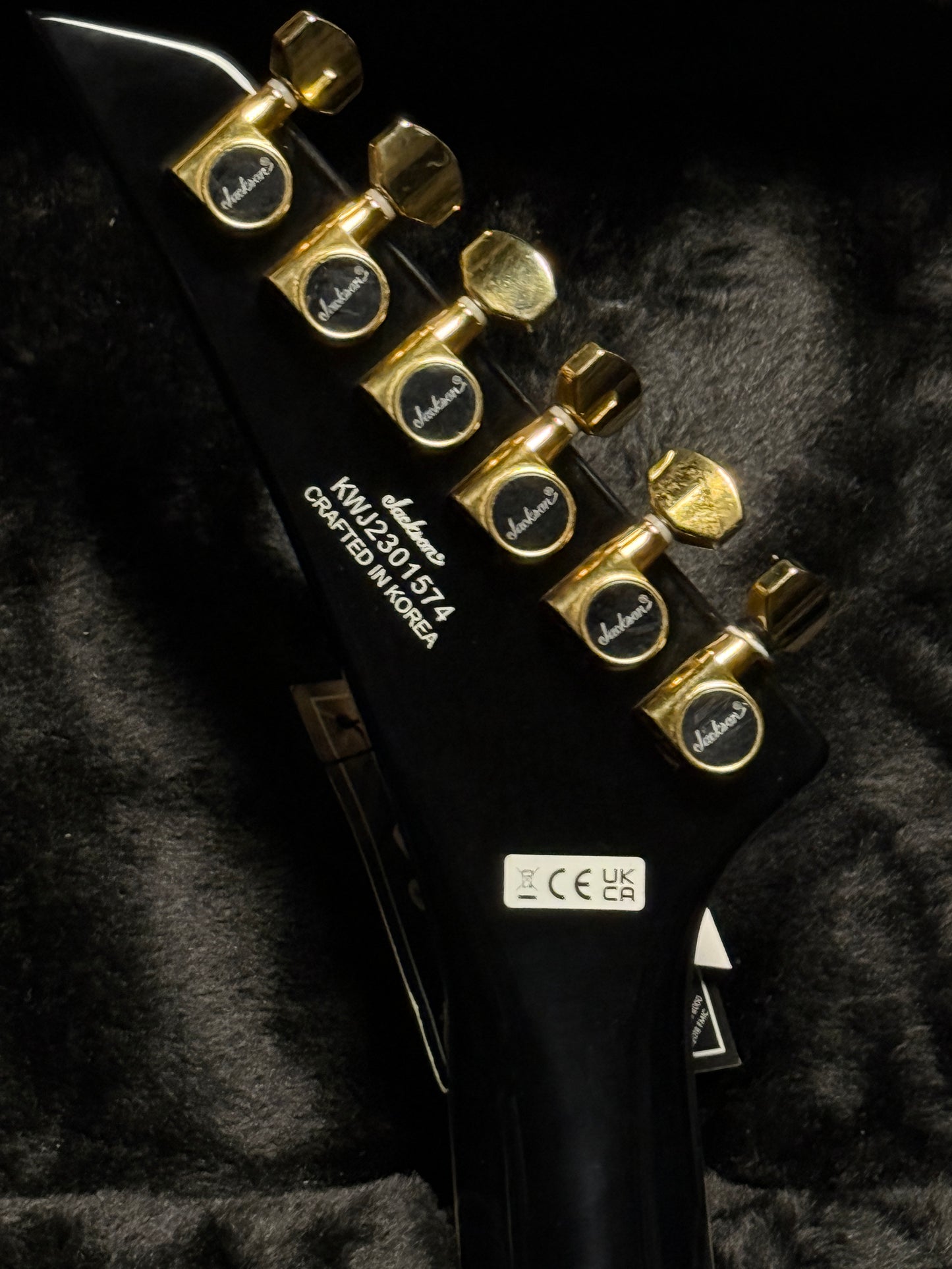 Jackson Concept Series Rhoads FR H Ebony FB with Black with White Pinstripes