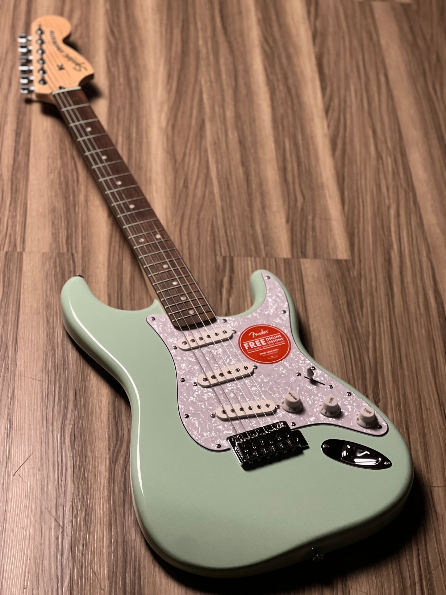 Squier FSR Affinity Series Stratocaster with White Pearloid Pickguard and Laurel FB in Surf Green