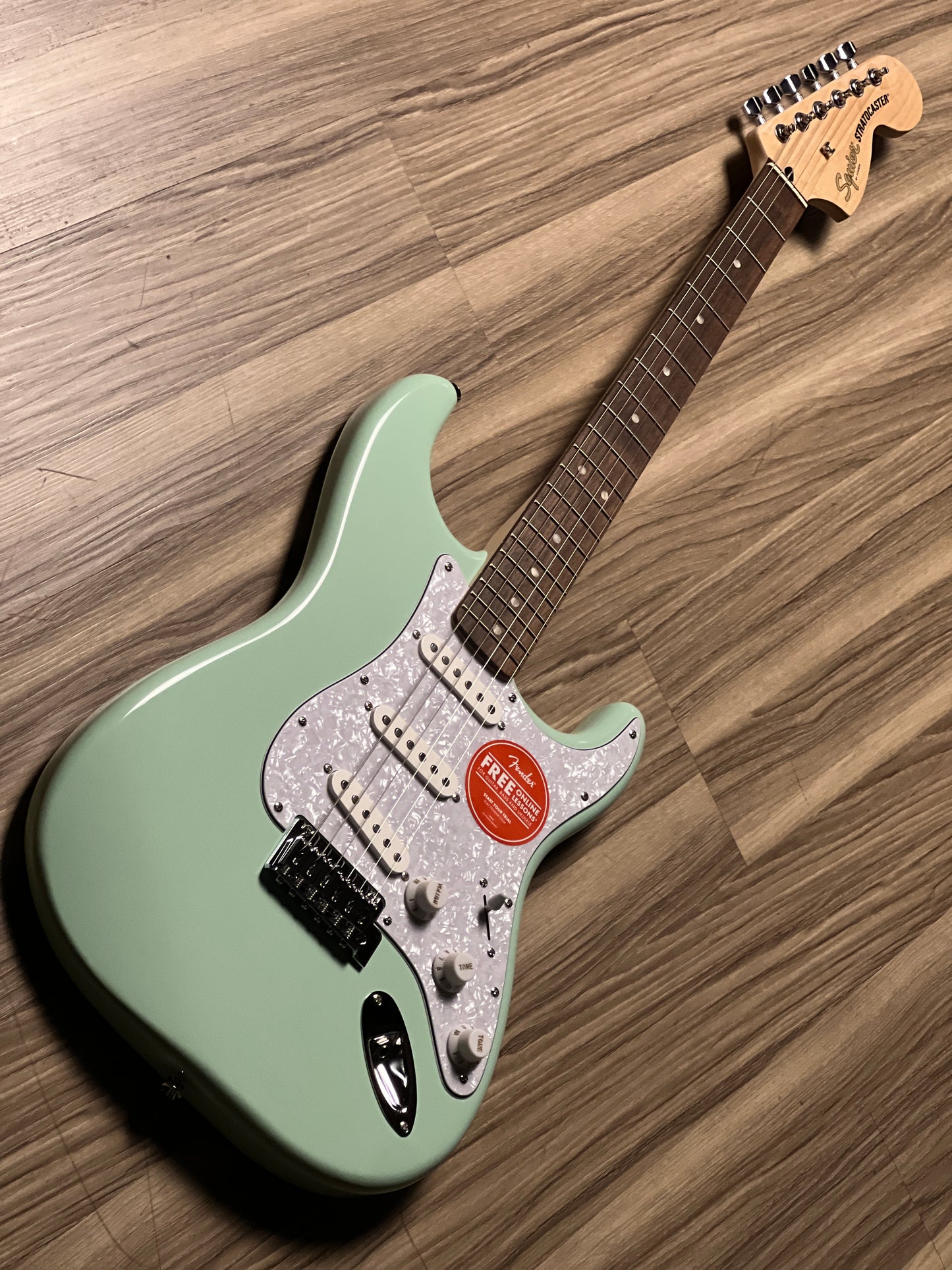 Squier FSR Affinity Series Stratocaster with White Pearloid Pickguard and Laurel FB in Surf Green