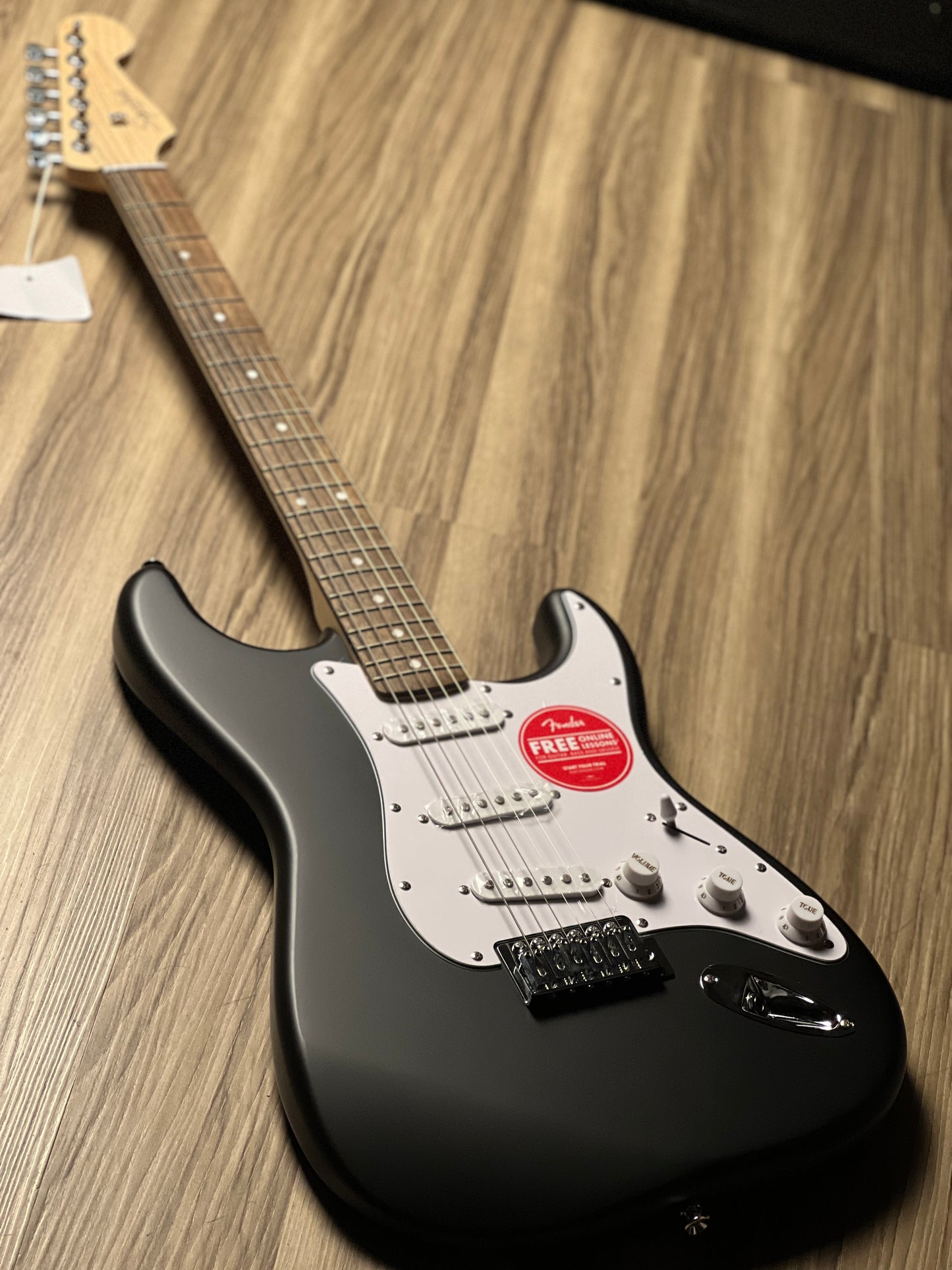 Squier Debut Series Stratocaster Electric Guitar Laurel FB In Black