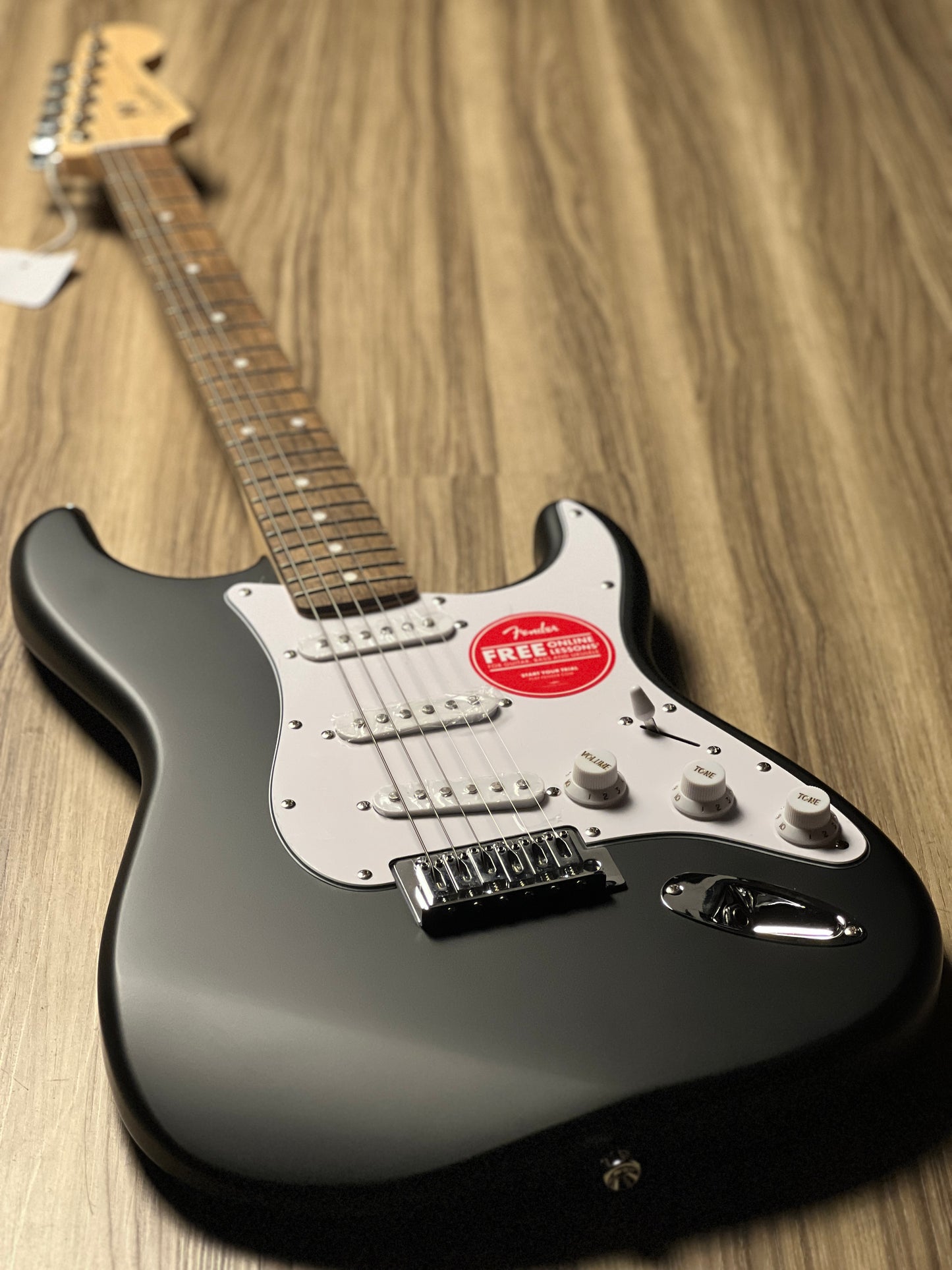 Squier Debut Series Stratocaster Electric Guitar Laurel FB In Black