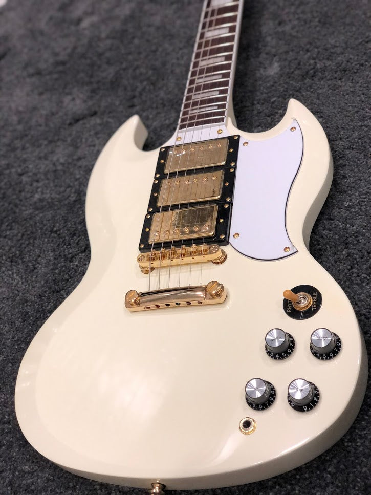 Tokai SG-71S AI in Antique Ivory with Gold Hardware and 3 pickups