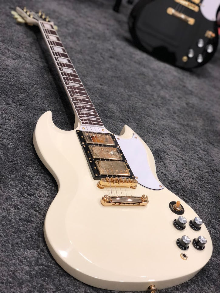 Tokai SG-71S AI in Antique Ivory with Gold Hardware and 3 pickups