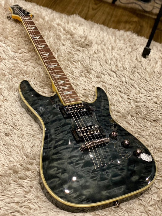 Schecter Omen Extreme-6 in Seethru Black