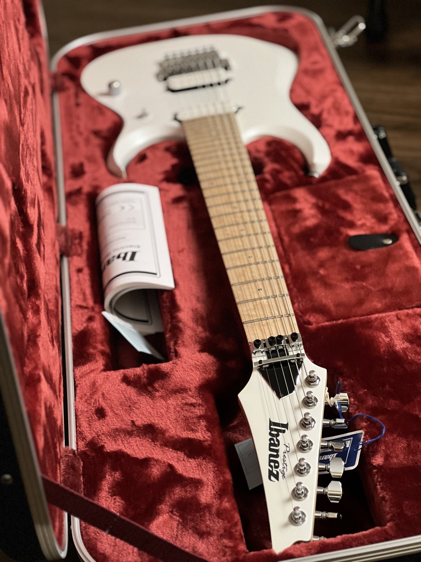 Ibanez Prestige RGD3127-PWF 7-String w/ Case in Pearl White Flat